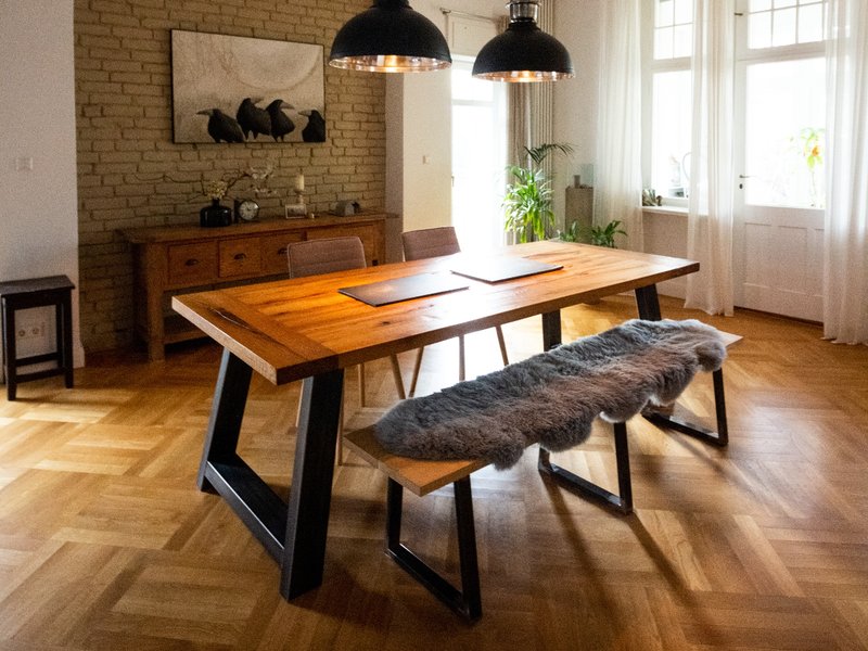 Herringbone pattern hardwood in a dining room