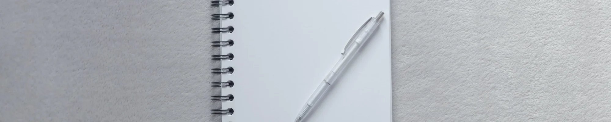 Notepad on a blank white surface